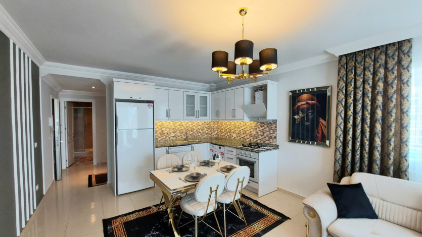 Полностью меблированные апартаменты на границе районов Кестель  и Махмутлар, 110м - Ракурс 11