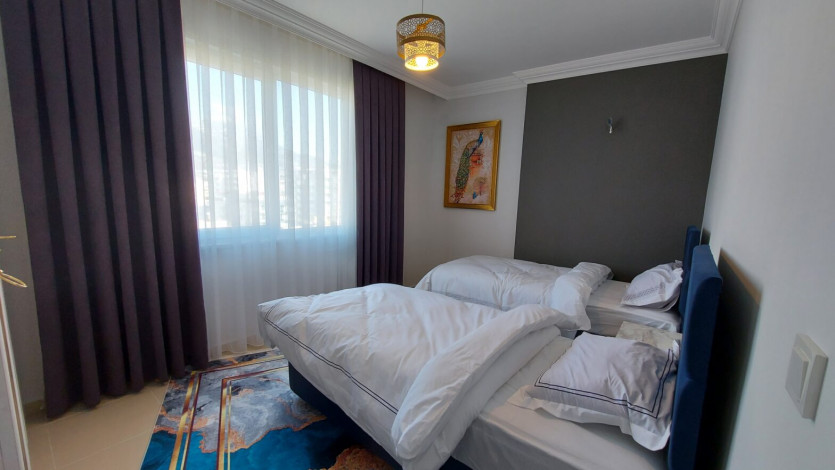 Полностью меблированные апартаменты на границе районов Кестель  и Махмутлар, 110м - Ракурс 14