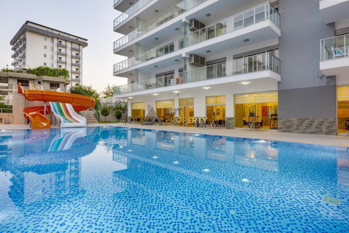 Квартира с видом на море 2+1 с новой мебелью в Махмутларе на высоком этаже, 120 м2 - Ракурс 12