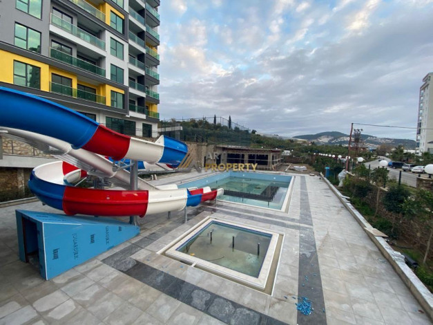 Квартира 2+1 в Махмутларе с новой мебелью от надежного застройщика, 100 м2 - Ракурс 23