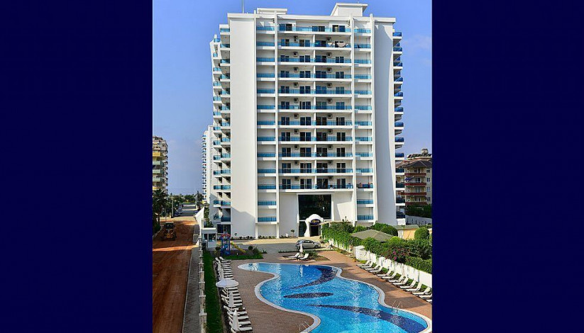 Квартира большой площади с видом на море планировки 1+1 в Махмутларе в комплексе на первой линии моря, 93 м2 - Ракурс 18