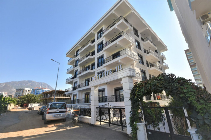 Квартира 1+1 в новом современном комплексе, район Махмутлар, 60 м2 - Ракурс 19