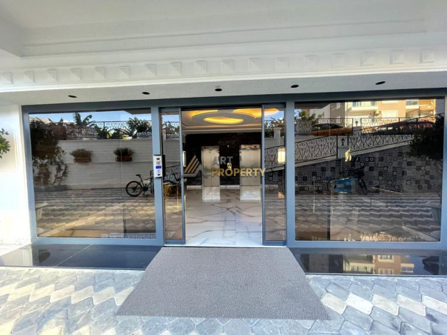 Квартира 1+1 в новом современном комплексе, район Махмутлар, 60 м2 - Ракурс 20