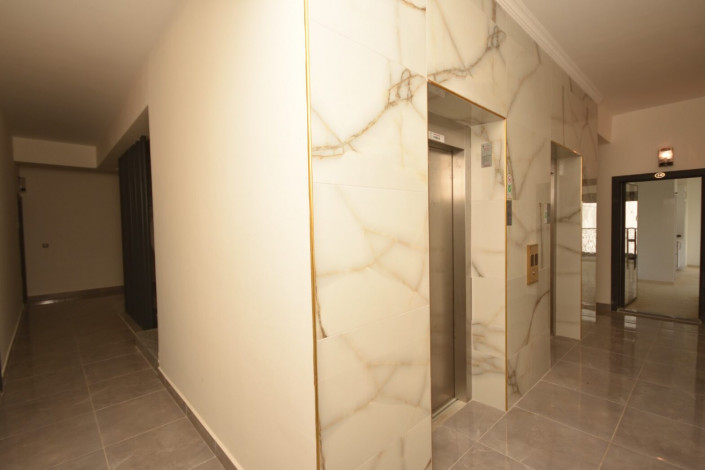 Квартира 1+1 в новом современном комплексе, район Махмутлар, 60 м2 - Ракурс 45