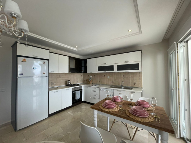 Меблированные апартаменты в районе Мамутлар, 105м - Ракурс 12