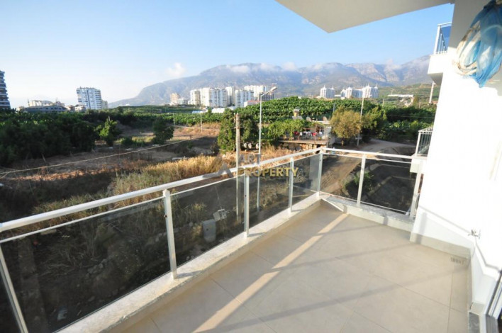 Меблированные апартаменты в районе Мамутлар, 60м - Ракурс 2