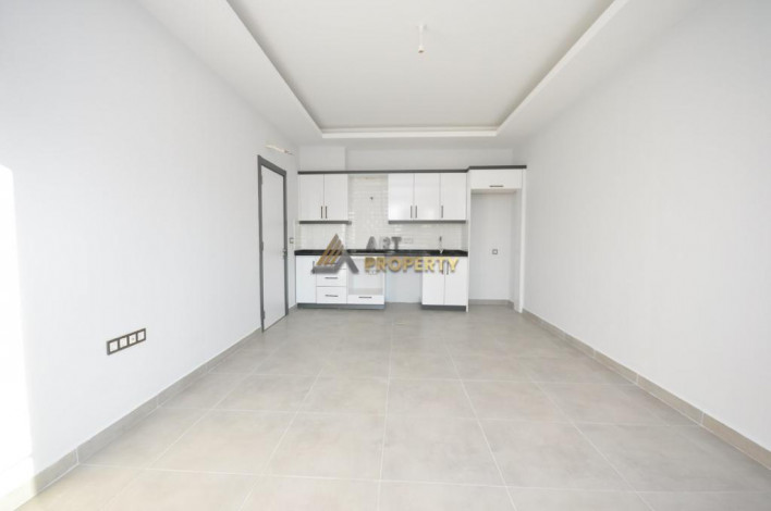 Меблированные апартаменты в районе Мамутлар, 60м - Ракурс 4