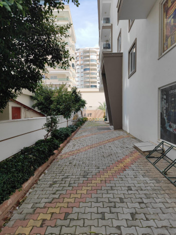 Меблированные апартаменты в районе Мамутлар, 70м - Ракурс 20