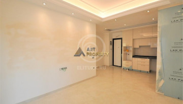 Квартира 1+1 в центре  Махмутлар, 75м - Ракурс 12