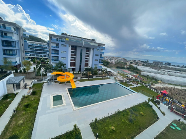 Три меблированные  квартиры в новом доме  с видом на море в районе Каргыджак, 50м - Ракурс 2