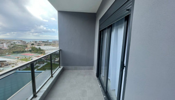 Три меблированные  квартиры в новом доме  с видом на море в районе Каргыджак, 50м - Ракурс 4
