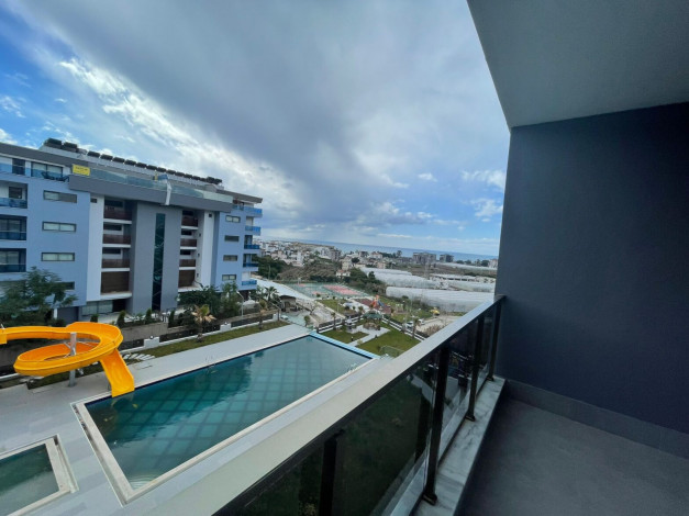 Три меблированные  квартиры в новом доме  с видом на море в районе Каргыджак, 50м - Ракурс 4