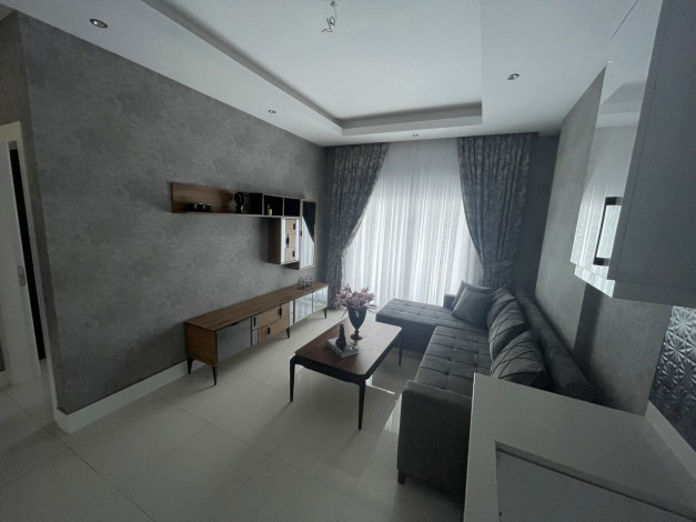 Три меблированные  квартиры в новом доме  с видом на море в районе Каргыджак, 50м - Ракурс 5