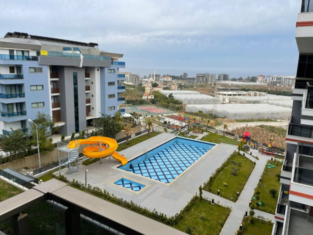 Три меблированные  квартиры в новом доме  с видом на море в районе Каргыджак, 50м - Ракурс 13