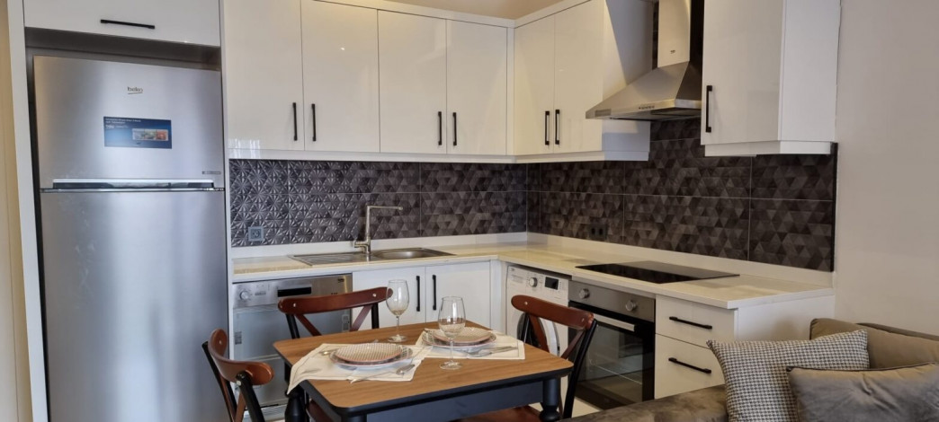 Три меблированные  квартиры в новом доме  с видом на море в районе Каргыджак, 50м - Ракурс 19