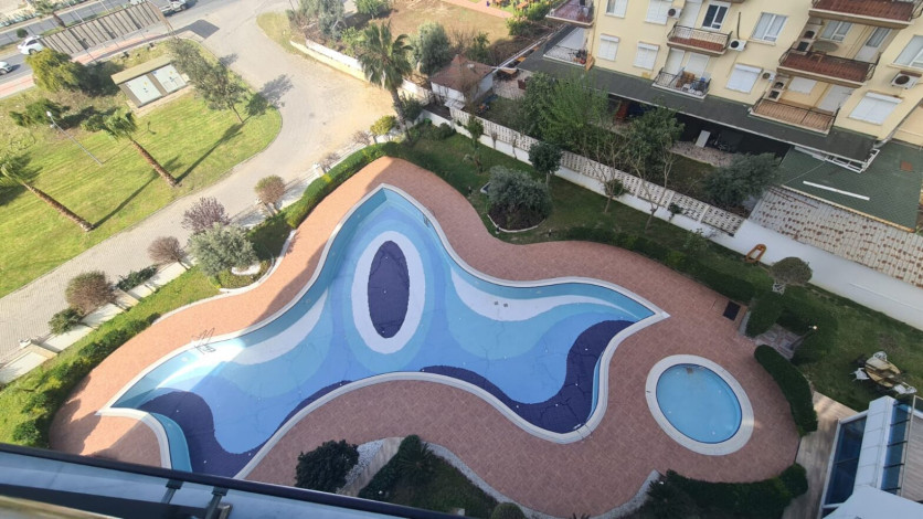 Двухкомнатная квартира на первой линии Махмутлара, площадью 80 м! - Ракурс 9