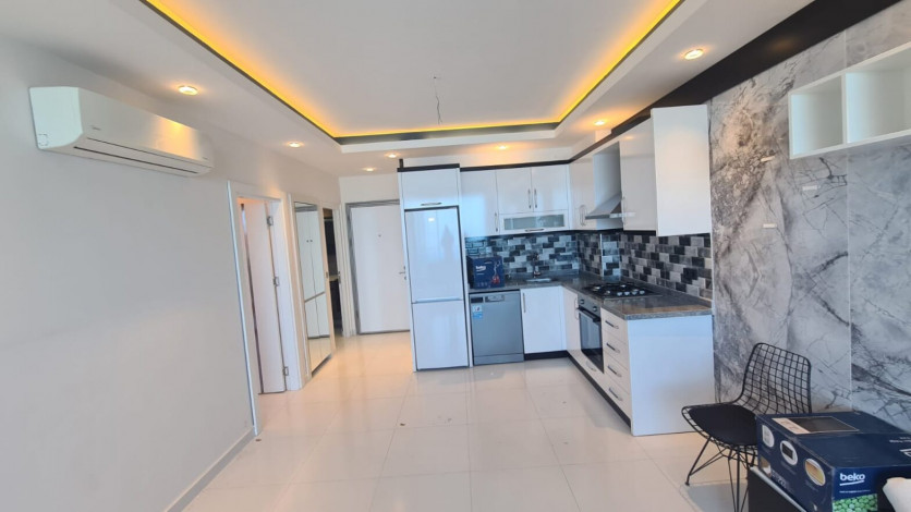 Двухкомнатная квартира на первой линии Махмутлара, площадью 80 м! - Ракурс 13