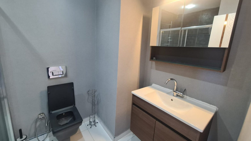 Двухкомнатная квартира на первой линии Махмутлара, площадью 80 м! - Ракурс 17