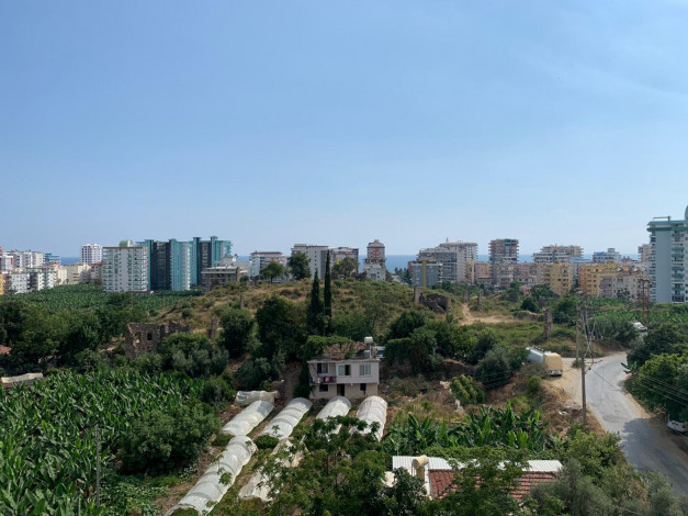 Двухкомнатная квартира в районе Махмутлар,62м2 - Ракурс 9