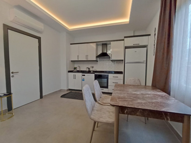 Двухкомнатная квартира в районе Махмутлар, площадью 60м. - Ракурс 21