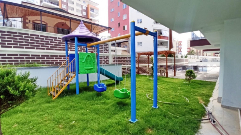 Квартира 1+1 в новом комплексе, район Махмутлар, 65 м2 - Ракурс 9