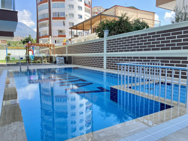 Квартира 1+1 в новом комплексе, район Махмутлар, 65 м2 - Ракурс 17