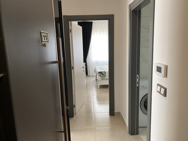 Квартира 1+1 в новом комплексе, район Махмутлар, 65 м2 - Ракурс 23