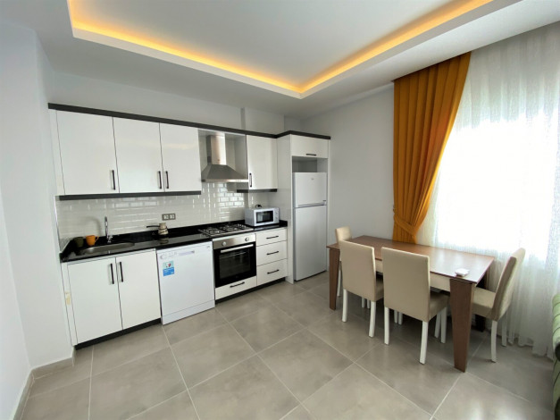 Квартира 1+1 в новом комплексе, район Махмутлар, 65 м2 - Ракурс 25