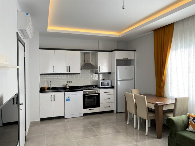 Квартира 1+1 в новом комплексе, район Махмутлар, 65 м2 - Ракурс 26