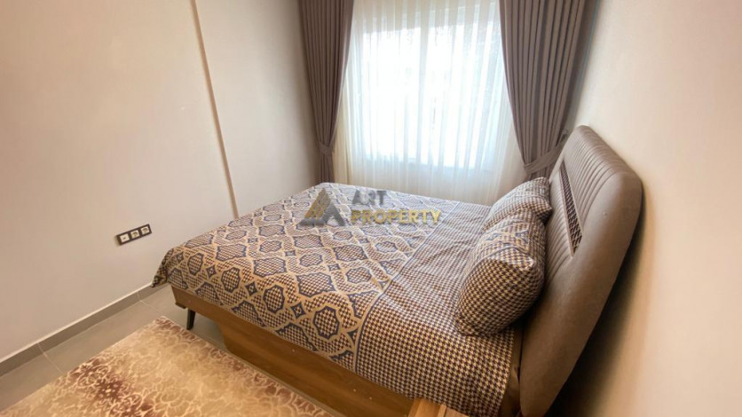 Квартира 1+1 в новом комплексе, район Махмутлар, 65 м2 - Ракурс 3