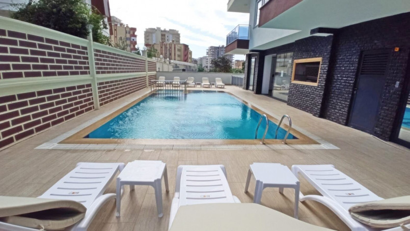 Квартира 1+1 в новом комплексе, район Махмутлар, 65 м2 - Ракурс 9