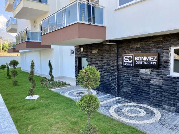 Квартира 1+1 в новом комплексе, район Махмутлар, 65 м2 - Ракурс 23