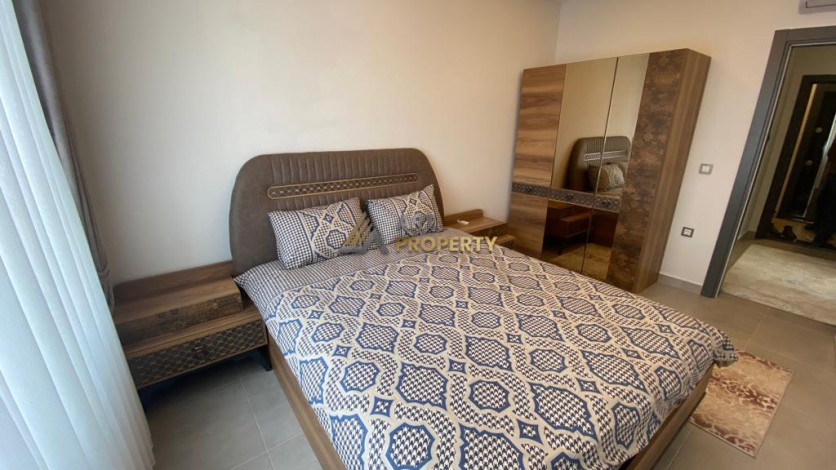 Квартира 1+1 в новом комплексе, район Махмутлар, 65 м2 - Ракурс 24