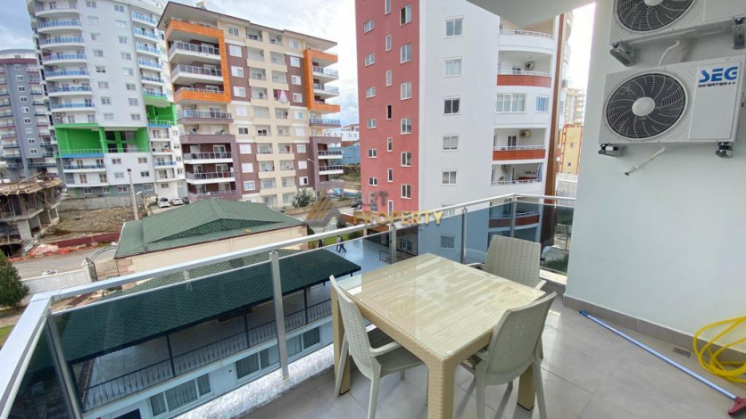 Квартира 1+1 в новом комплексе, район Махмутлар, 65 м2 - Ракурс 27