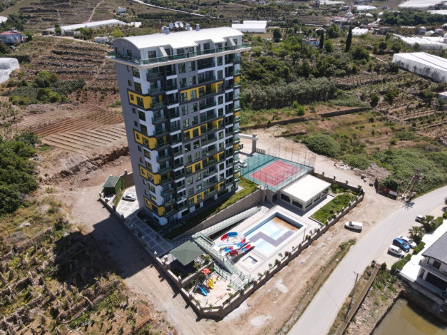 Двухкомнатная меблированная квартира в новом комплексе с богатой внутренней инфраструктурой в районе Махмутлар, 40м - Ракурс 21