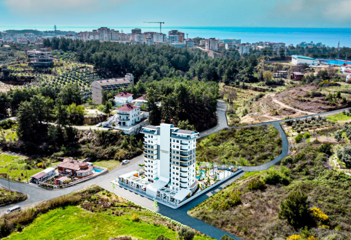 Новый инвестиционный проект в районе Авсаллар в 950 метрах к морю - Ракурс 10