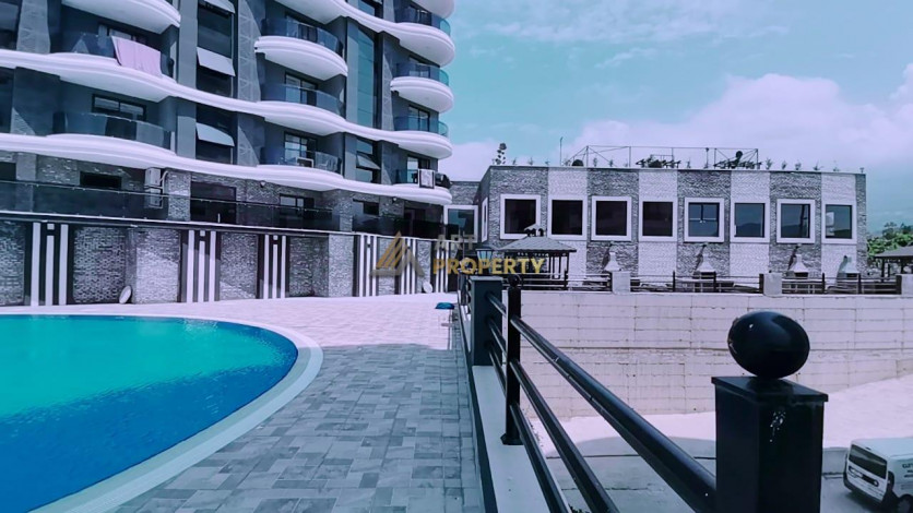 Апартаменты 2+1 в новом современном комплексе в районе Махмутлар - Ракурс 11