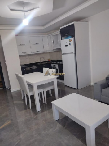 Меблированная квартира планировки 1+1, 75м2 в районе Махмутлар - Ракурс 8