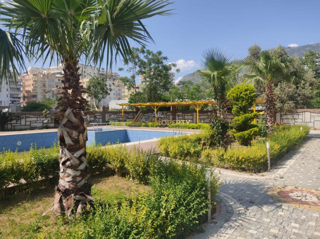 Меблированная квартира планировки 1+1, 75м2 в районе Махмутлар - Ракурс 18