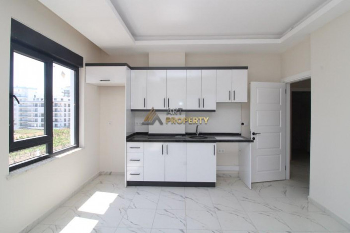 Новая квартира 1+1, 54м2 в комплексе, район Махмутлар - Ракурс 5