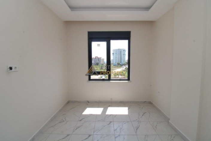 Новая квартира 1+1, 54м2 в комплексе, район Махмутлар - Ракурс 8