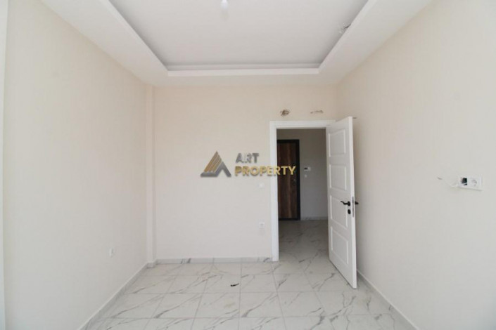 Новая квартира 1+1, 54м2 в комплексе, район Махмутлар - Ракурс 9