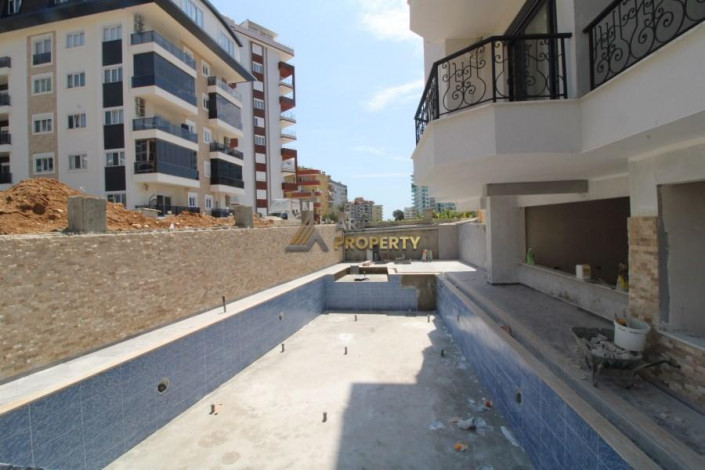 Новая квартира 1+1, 54м2 в комплексе, район Махмутлар - Ракурс 13