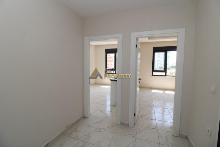 Новая квартира 1+1, 54м2 в комплексе, район Махмутлар - Ракурс 17