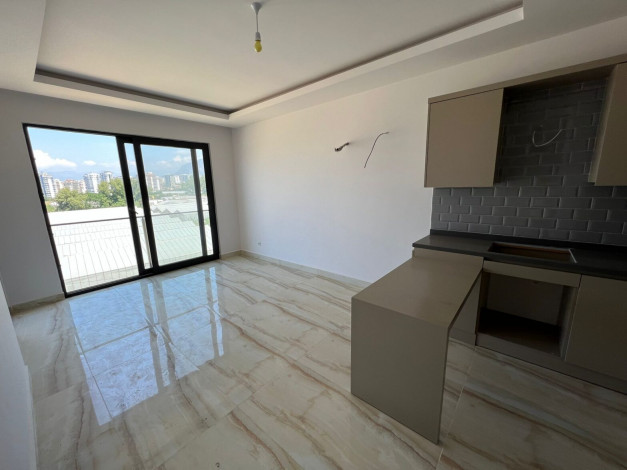 Две квартиры планировки 1+1, 65м2 в новом ЖК в районе  Каргыджак - Ракурс 19