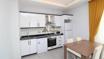 Новая меблированная квартира планировки 1+1, 56м2 в жилом комплексе в районе Махмутлар - Ракурс 9