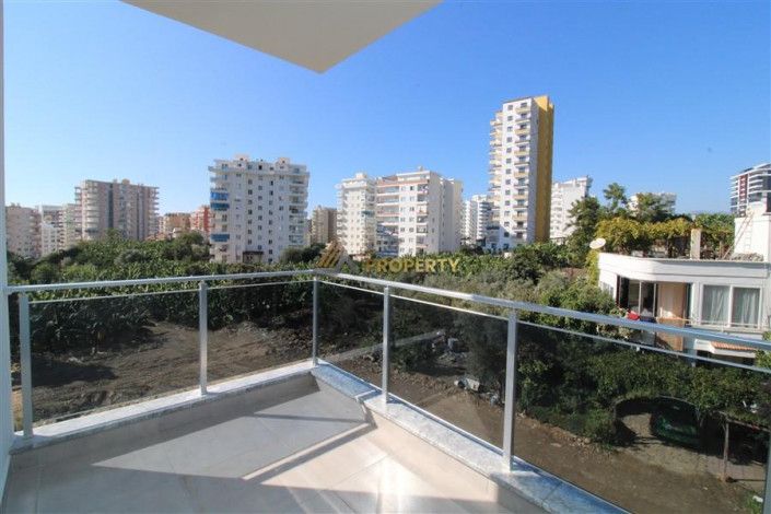 Новая меблированная квартира планировки 1+1, 56м2 в жилом комплексе в районе Махмутлар - Ракурс 12