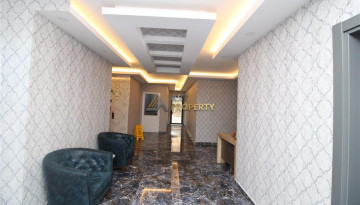 Новая меблированная квартира планировки 1+1, 56м2 в жилом комплексе в районе Махмутлар - Ракурс 18