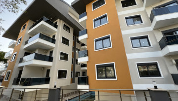 Квартиры планировок 1+1 и 2+1 в новом жилом комплексе в центре Алании - Ракурс 11