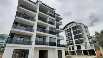 Апартаменты планировки 2+1, 100м2 с видом на море в комплексе уровня ультра люкс, район Каргыджак - Ракурс 10